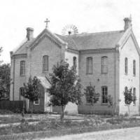 St. Hubert's School showing wind mill in background. Circa 1910