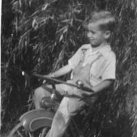 Dick Vogel on tricycle - circa unknown