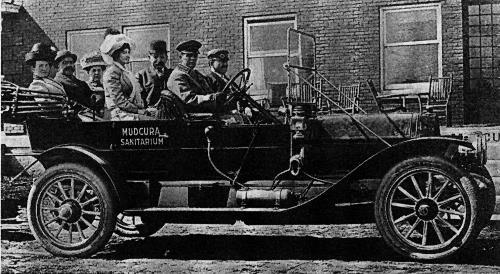 Dr. Henry Fischer's automobile for transporting train passengers - Mudcura