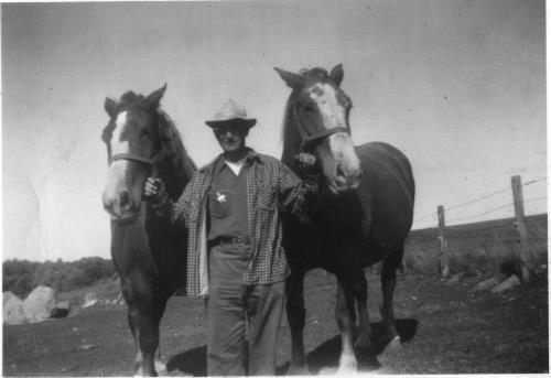 Dan Kerber with work horses he raised himself - 1938