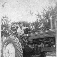 Roger Bongard on 1944 John Deere 'A' tractor - circa 1945-1946